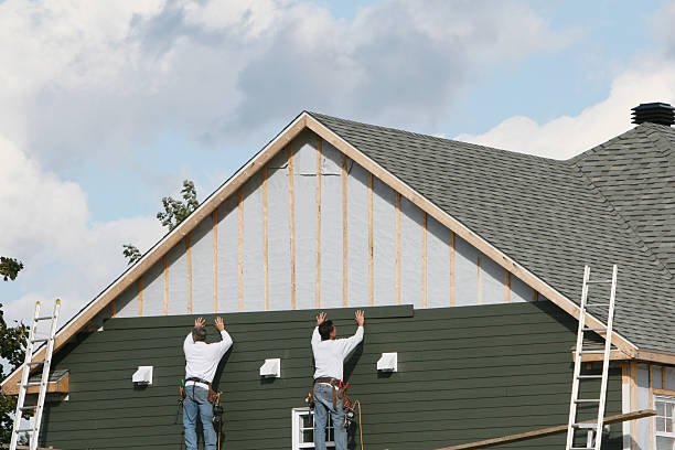Professional Storm Damage Siding Repair technician working in Lockbourne, OH